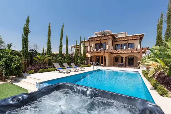 The private pool and hot tub at Villa AJ04